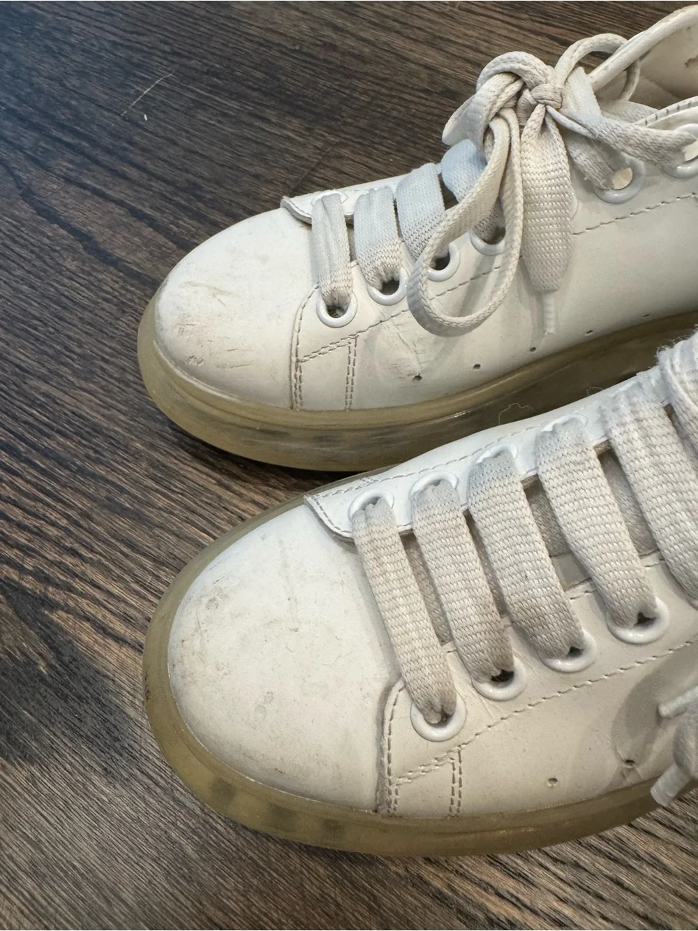 Alexander McQueen Black and White women’s sneakers with transparent sole